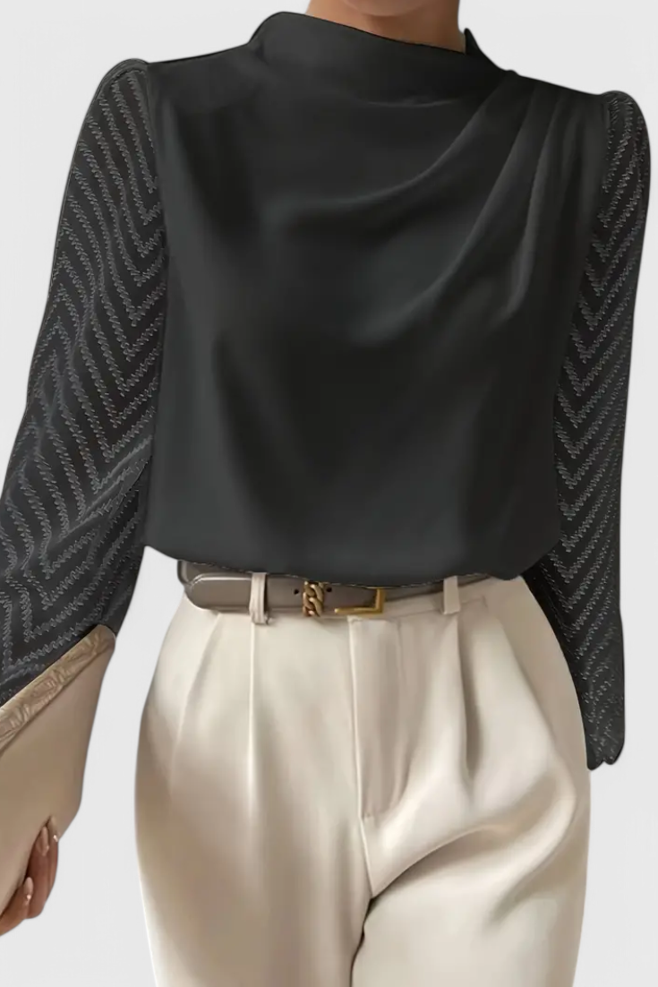 Blusa elegante de Zaraa con mangas transparentes