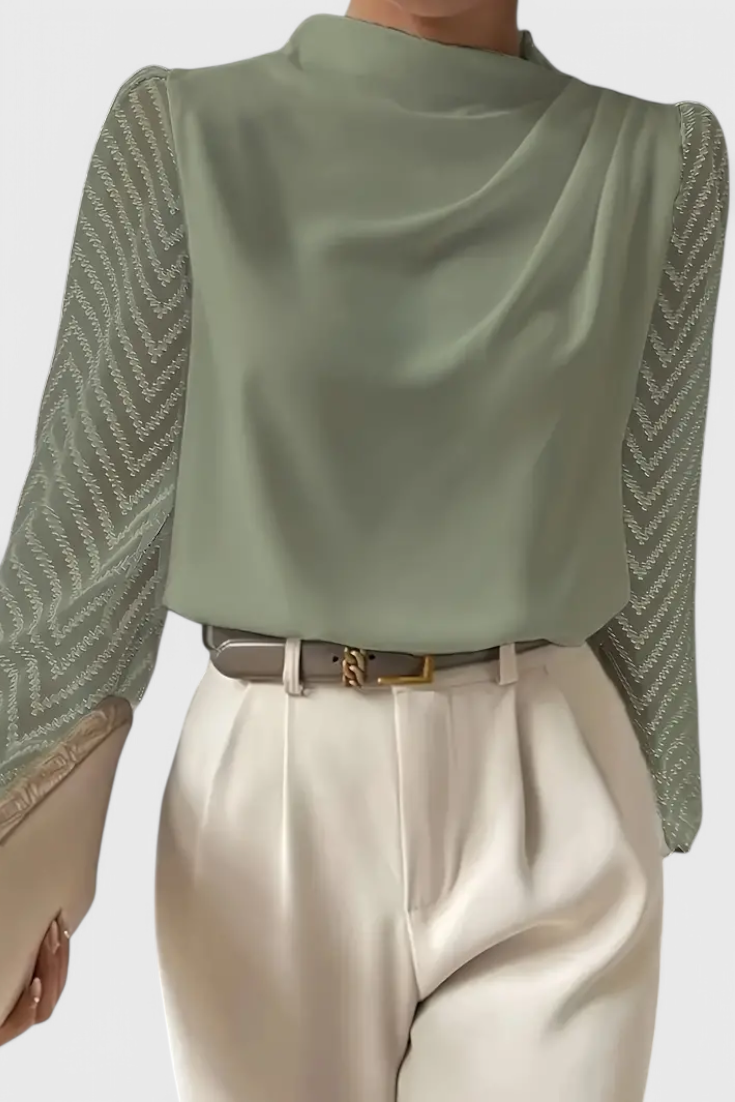 Blusa elegante de Zaraa con mangas transparentes