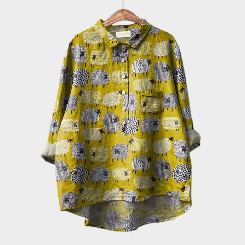 Ganna — Blusa premium con ribete de encaje