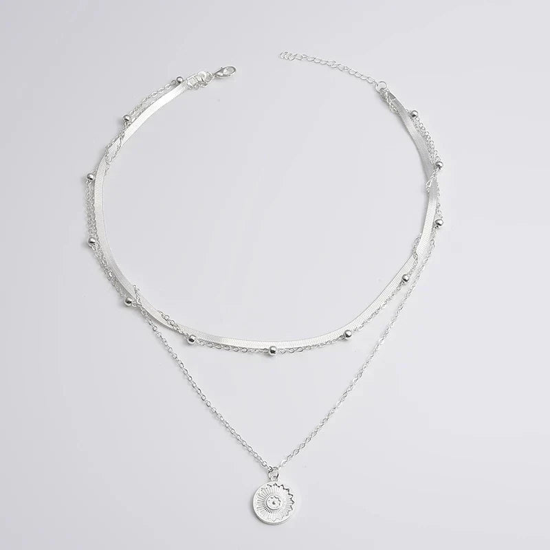 Collar triple de plata