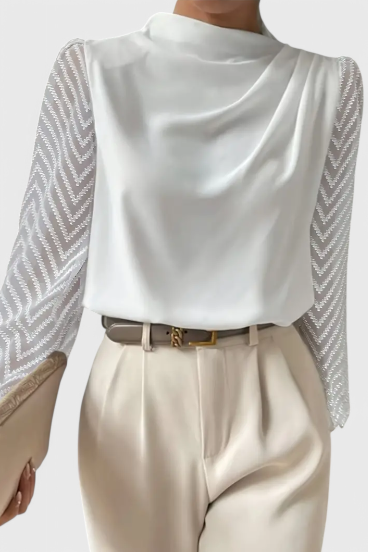 Blusa elegante de Zaraa con mangas transparentes