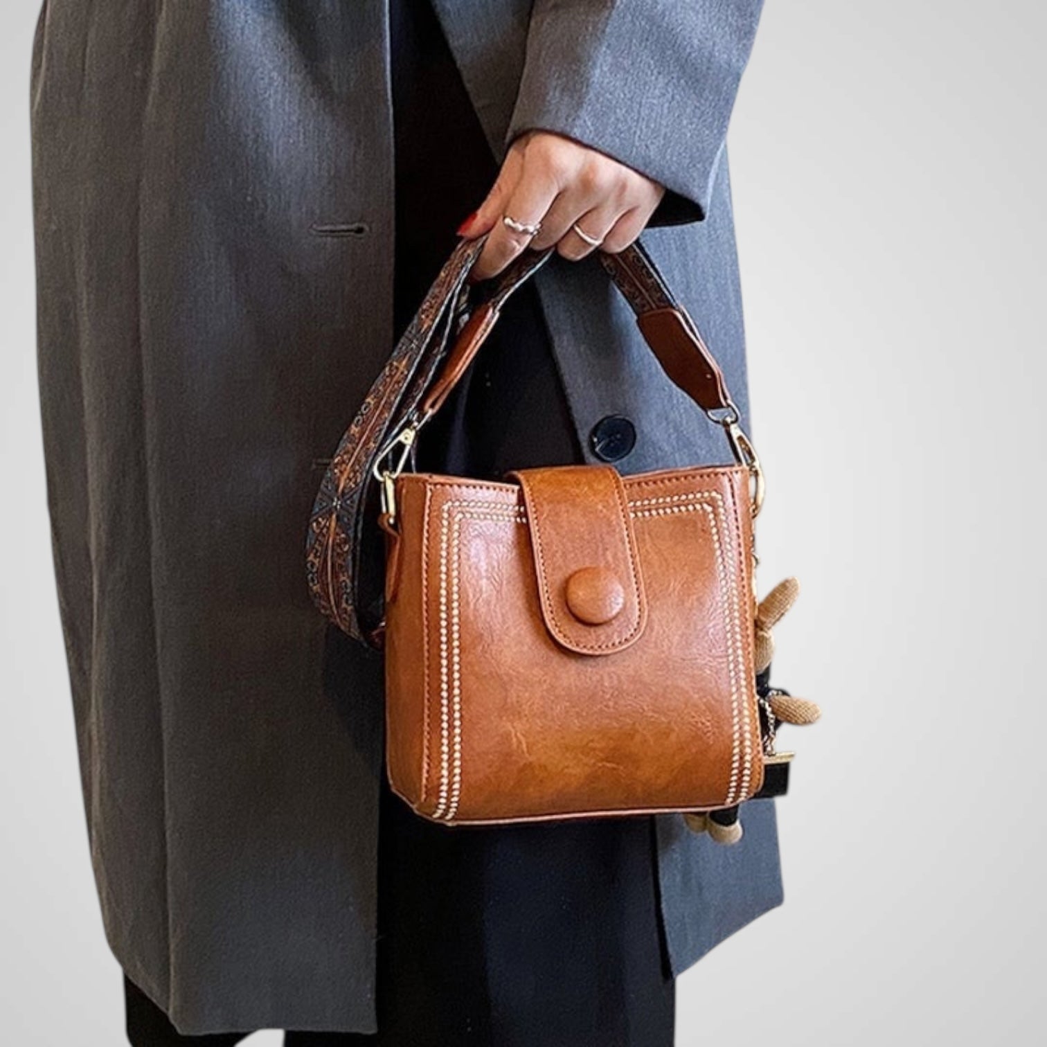 Bolsa retro para orina con correa ancha ajustable para el hombro